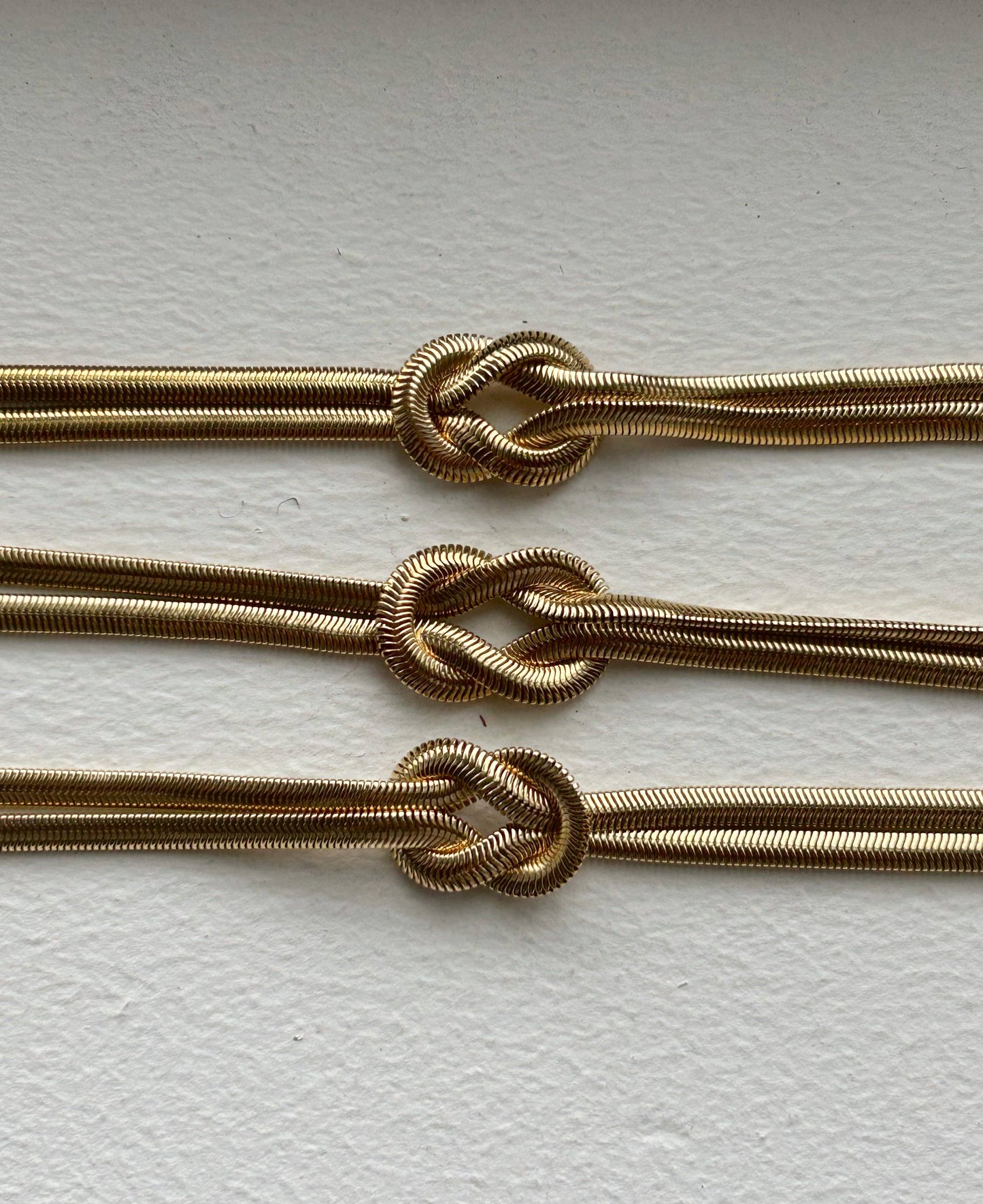 Maya Necklace – Double-Layered Snake Chain with Knot Centerpiece